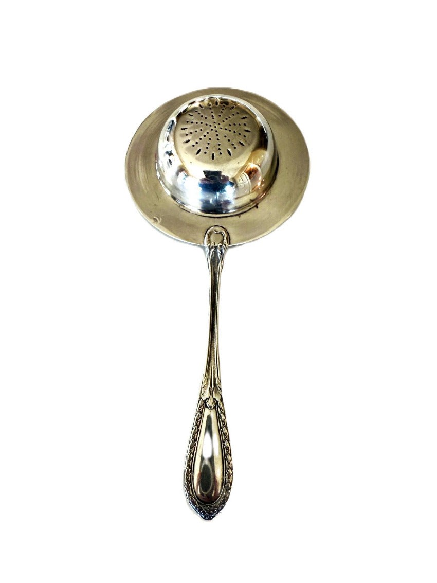back view of French silver tea strainer - 43chesapeakecourtantiques