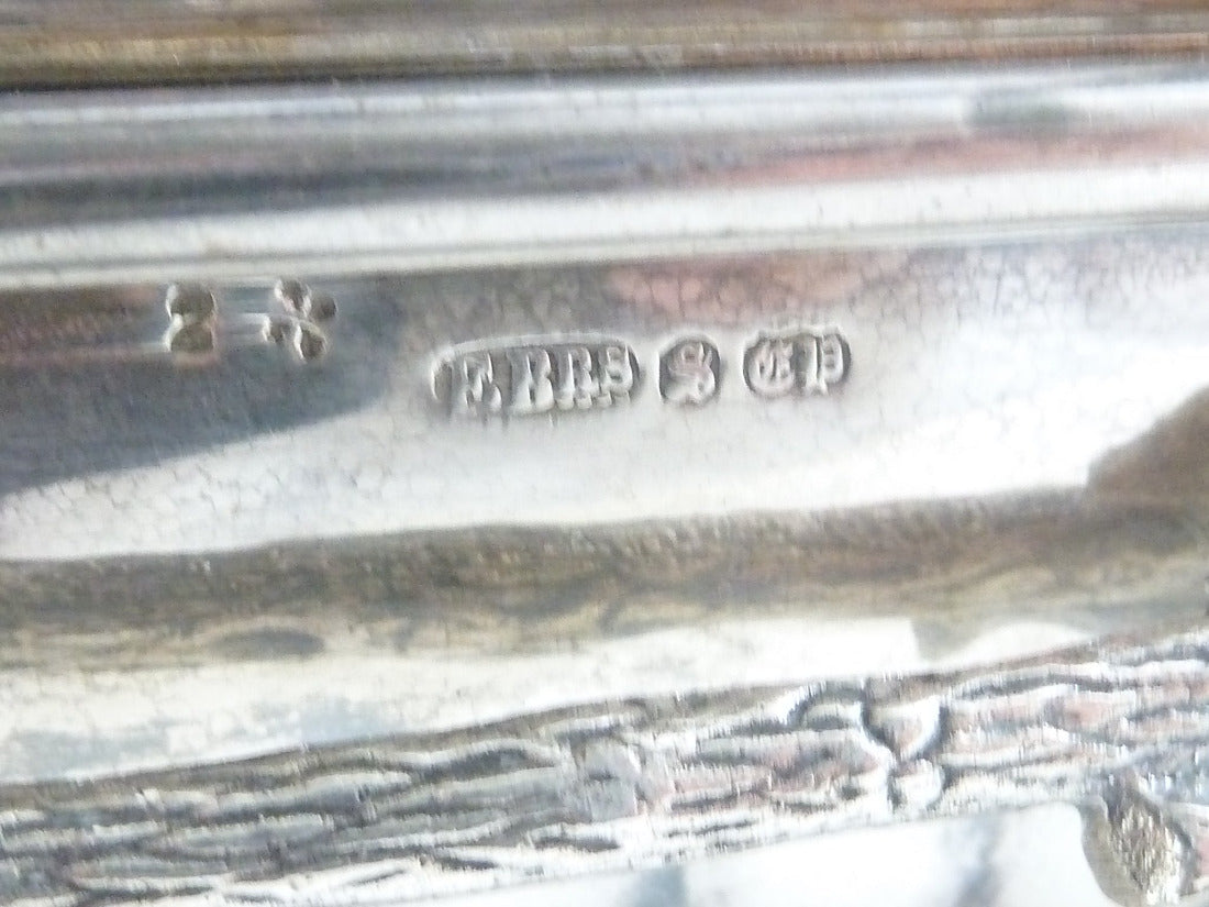 Fenton Brothers Sheffield maker's mark stamped on bottom of antique silver biscuit box