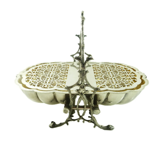 English Victorian silver plated biscuit warmer shown fully open with interior pierced grills