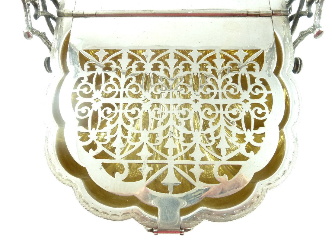 Close up of silver grill on Victorian English Biscuit box 