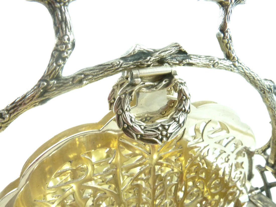 Close  up details of clasp on Fenton Bros of England silver plate biscuit box