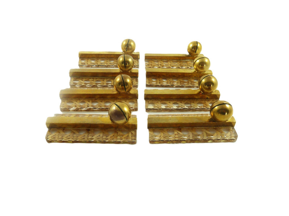 Lucite, cane and brass knife rests