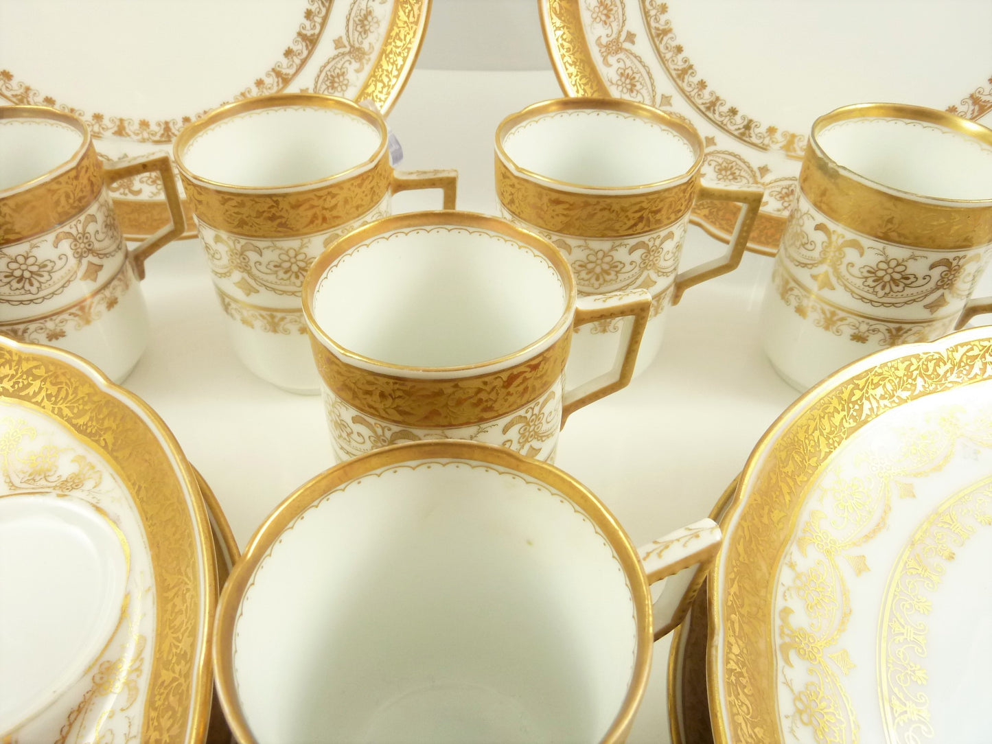 Antique Porcelain Dessert Plates & Demitasse Cups, C 1890 White with Gilt Trim - 43 Chesapeake Court Antiques